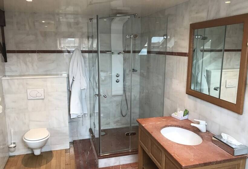 Номер Deluxe, D'angleterre