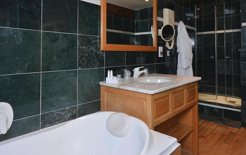 Номер Deluxe, D'angleterre