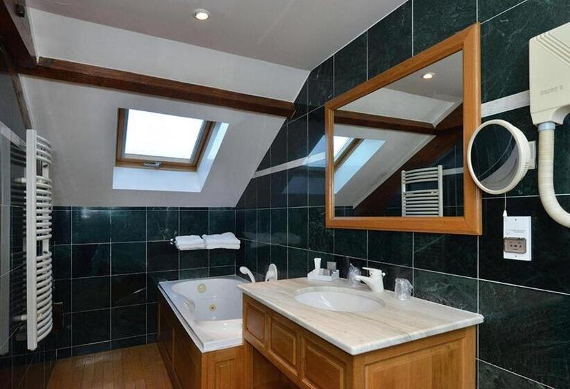 Номер Deluxe, D'angleterre