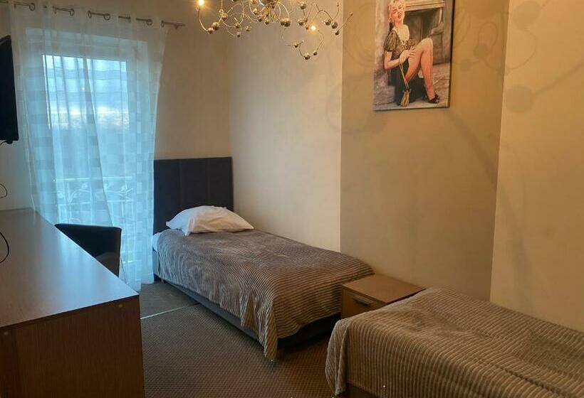 غرفة قياسية, Paola