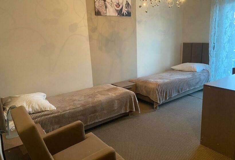 غرفة قياسية, Paola