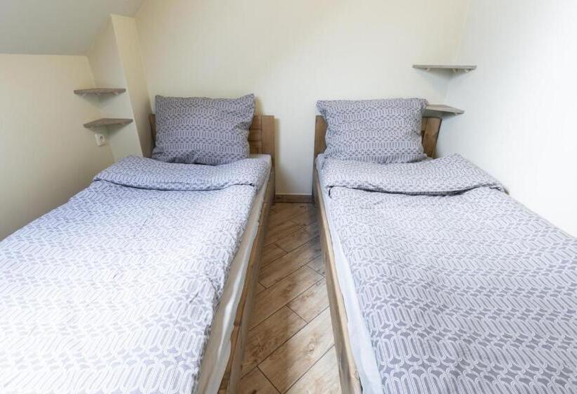 إستديو عائلى, Pokoje Gościnne Butryny