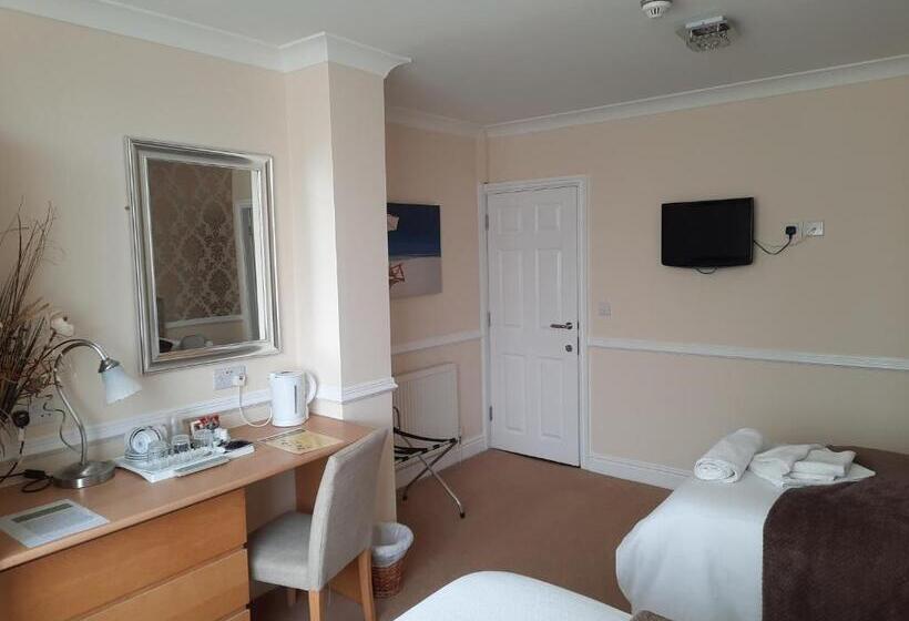 חדר משפחתי, Surrey House