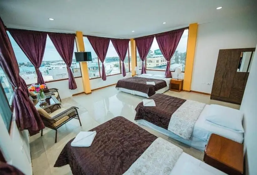 اتاق خانوادگی با چشمانداز دریا, Suites En El Centro