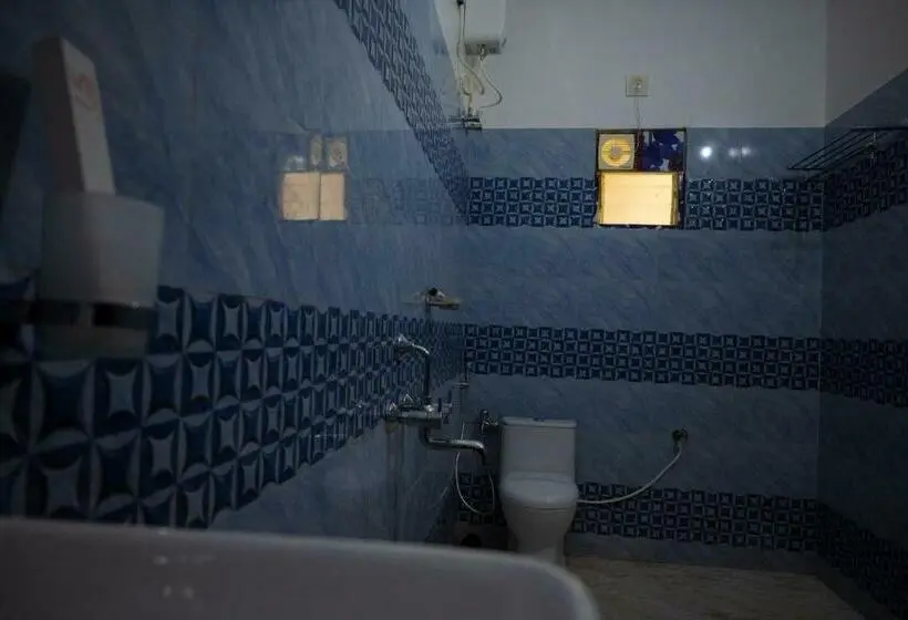 キングサイズベッドのデラックスルーム, Unique Shantiniketan