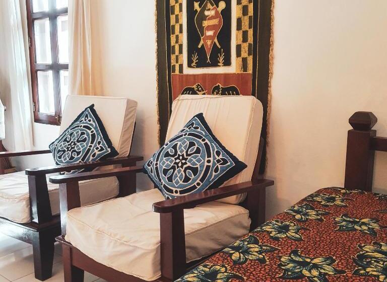 جناح مطلّ علي البحر, Flame Tree Cottages