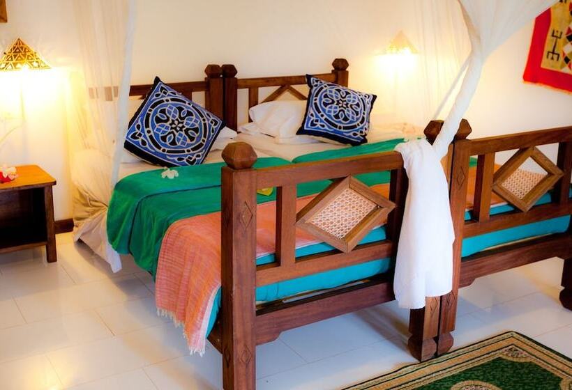 غرفة قياسية ثلاثية, Flame Tree Cottages