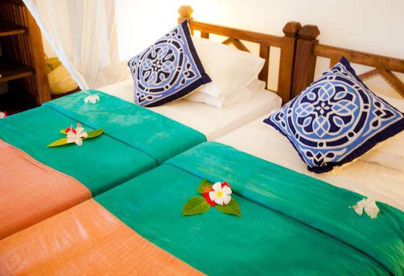 غرفة قياسية ثلاثية, Flame Tree Cottages