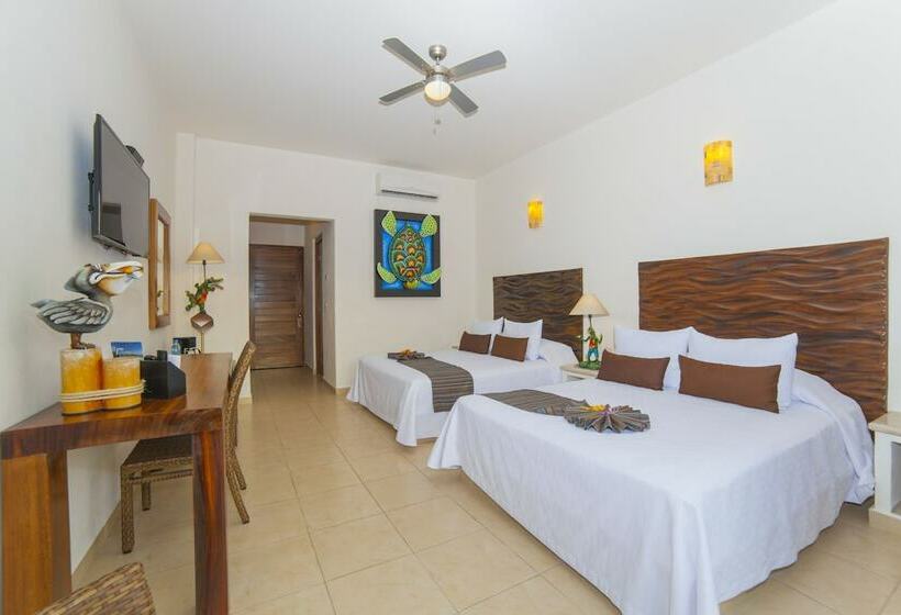 غرفه قياسيه سريرين مزدوجين, Quinta Bella Huatulco