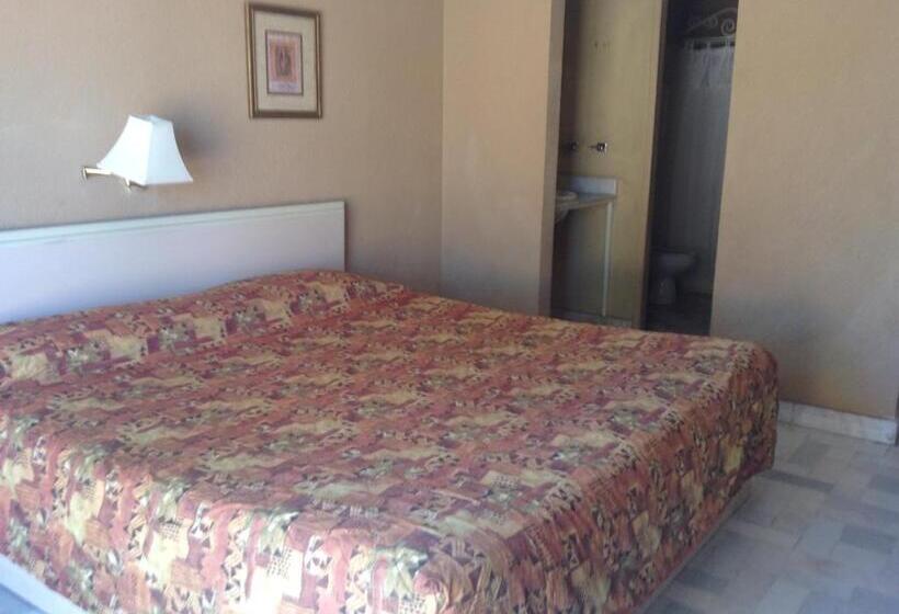 キングサイズベッドのスタンダードルーム, Los Jitos Hotel & Suites