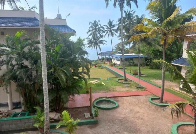 غرفة قياسية مطلّة علي البحر مزوَّدة بشُرفة, Seashore Beach Resort Varkala