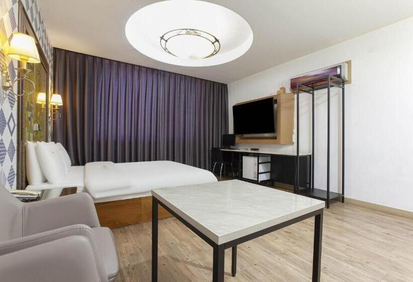 חדר דלוקס, Carlton