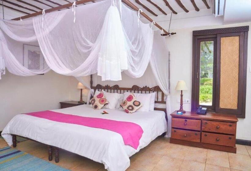 Camera Standard Vista Giardino, Jacaranda Indian Ocean Beach Resort