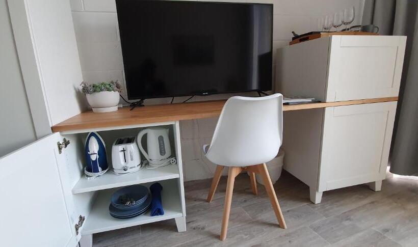 חדר סטנדרט לשלושה עם נוף לגינה, Peninsula Beach Motel