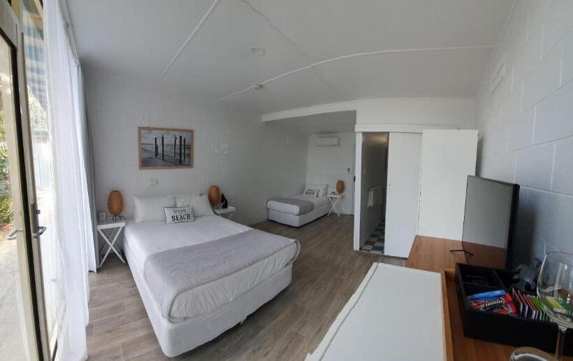 חדר סטנדרט לשלושה עם נוף לגינה, Peninsula Beach Motel