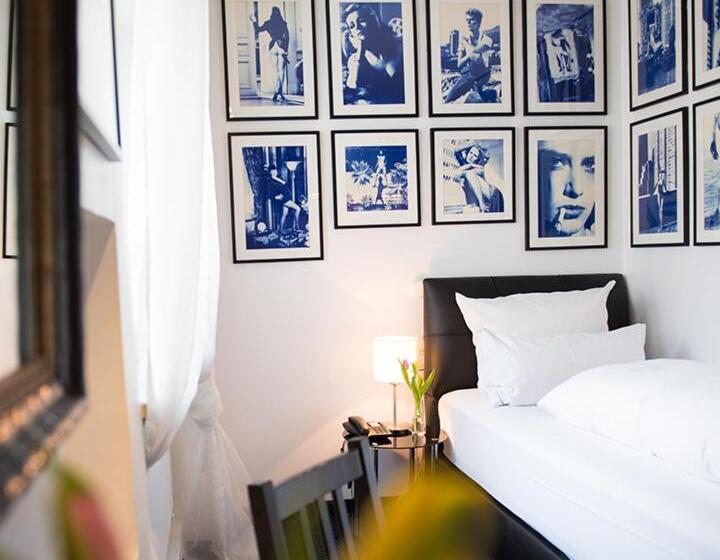 标准单人间, Ritzi