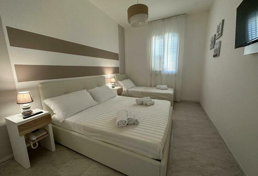 Quarto Triplo Estandar, Porto Cesareo