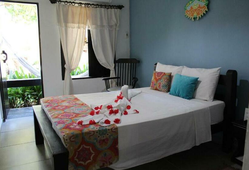 标准间侧面带海景, Pousada Dos Coqueiros