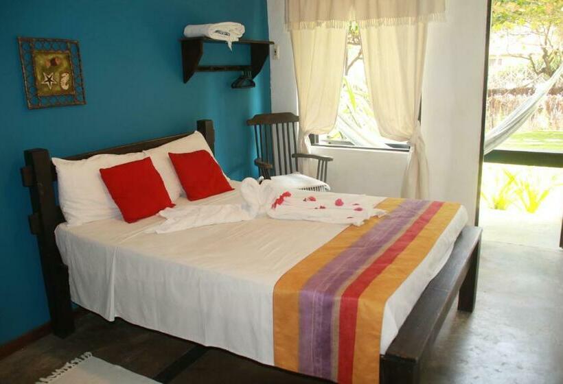 标准间侧面带海景, Pousada Dos Coqueiros