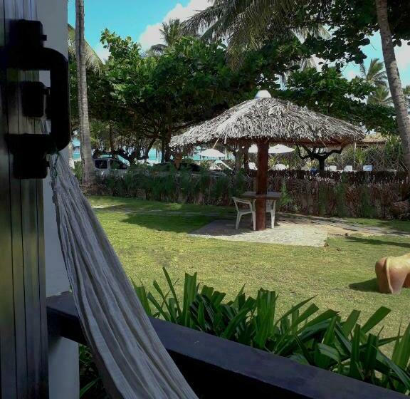 标准间侧面带海景, Pousada Dos Coqueiros