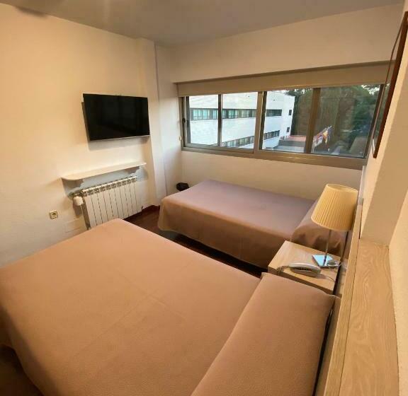 Номер Стандарт, Escuela Madrid