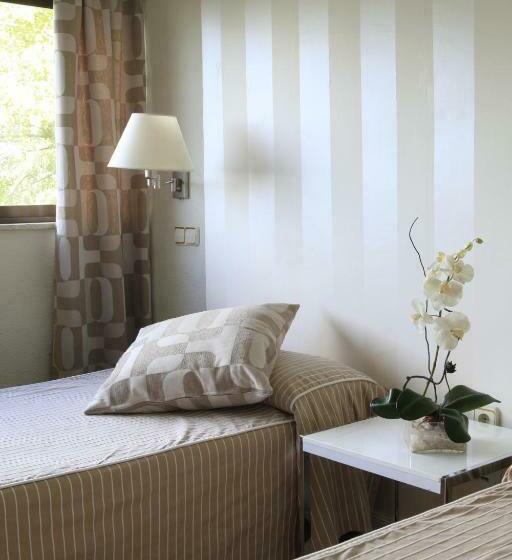 Номер Стандарт, Escuela Madrid