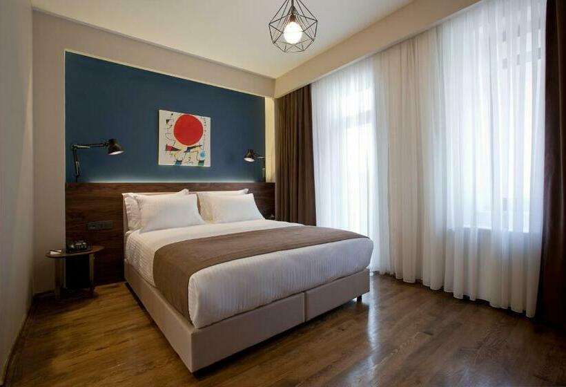 غرفة ديلوكس سرير كينج, Snog Rooms & Suites