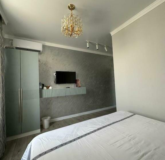 اتاق استاندارد با سرویس بهداشتی مشترک, Qas Saq