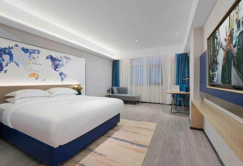 キングサイズベッドのスタンダードルーム, Kyriad Hotel Baoying Jinyuan Square High Speed Railway Station