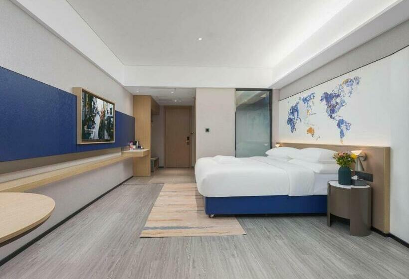 キングサイズベッドのスタンダードルーム, Kyriad Hotel Baoying Jinyuan Square High Speed Railway Station