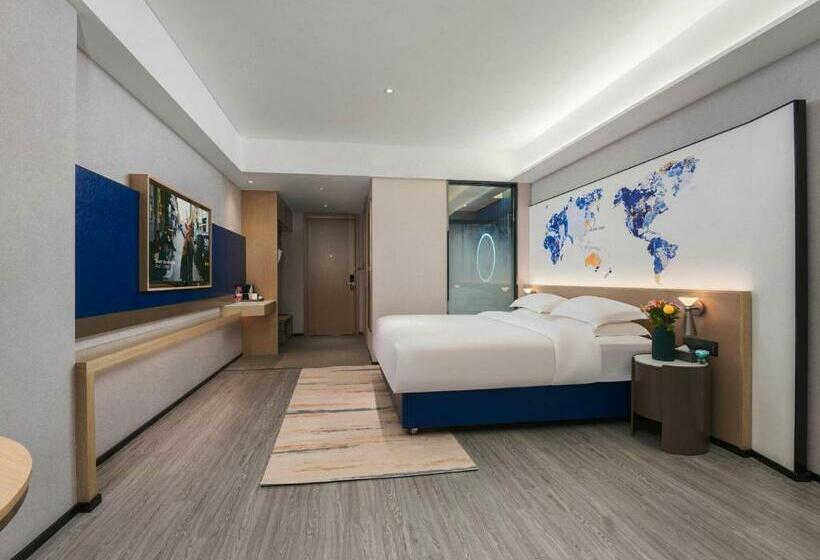 キングサイズベッドのスタンダードルーム, Kyriad Hotel Baoying Jinyuan Square High Speed Railway Station