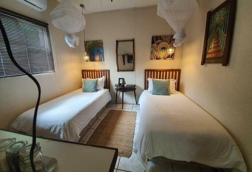 エコノミールーム, A Traveller's Palm