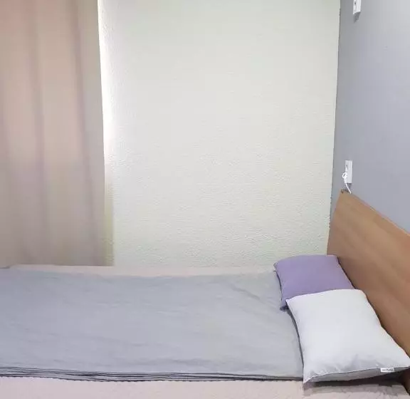 اتاق خانوادگی با چشم‌انداز جانبی دریا, Sokcho & Guesthouse