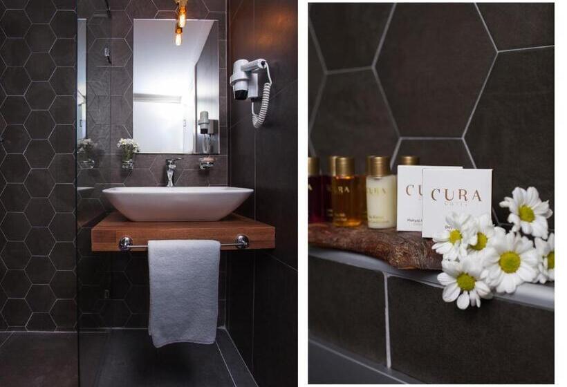 غرفة ديلوكس, Cura