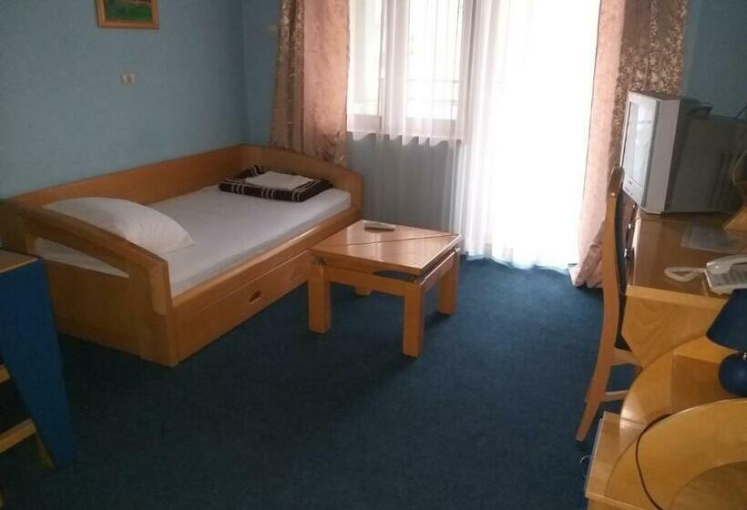 استودیوی استاندارد, Garni Hotel Lupus