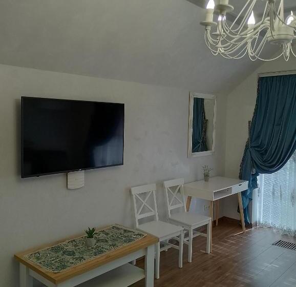 جناح مزوَّد بشرفة, Relax Complex