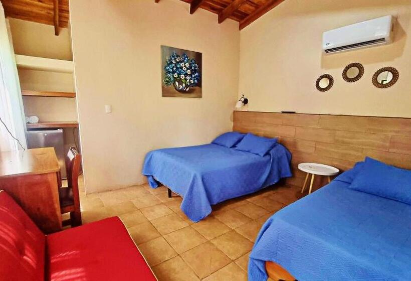 غرفة قياسية رباعية مطلة على الحديقة, Hacienda Angeles