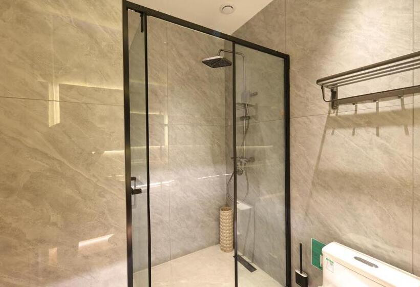 ルームシェアのワンベッド, Xishu Garden Inn   Travel Agency Service   Car Rent Service   English Speaking