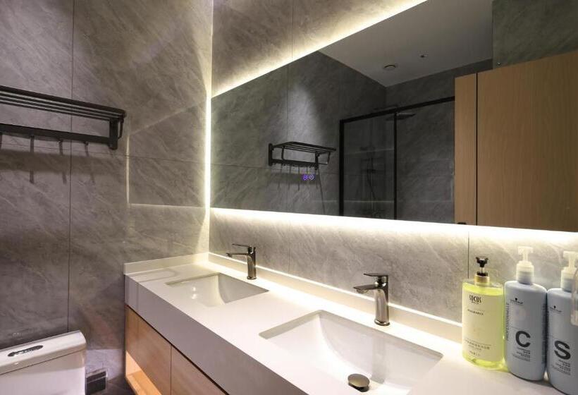 ルームシェアのワンベッド, Xishu Garden Inn   Travel Agency Service   Car Rent Service   English Speaking