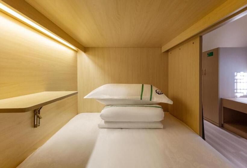 ルームシェアのワンベッド, Xishu Garden Inn   Travel Agency Service   Car Rent Service   English Speaking