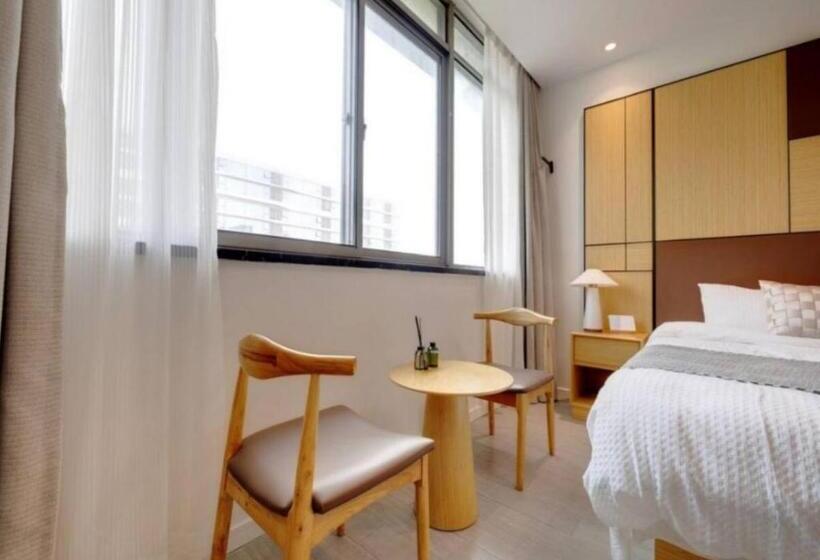 Quarto deluxe, Yueshe Apartment   Hongqiao Longbai Xincun