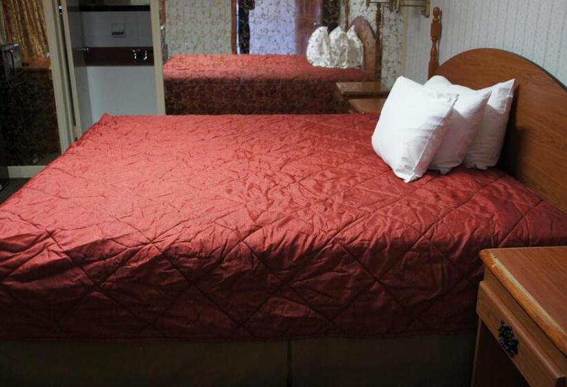 キングサイズベッドのスタンダードルーム, Royalinn & Suites