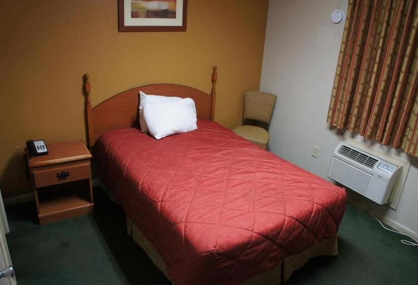 キングサイズベッドのスタンダードルーム, Royalinn & Suites