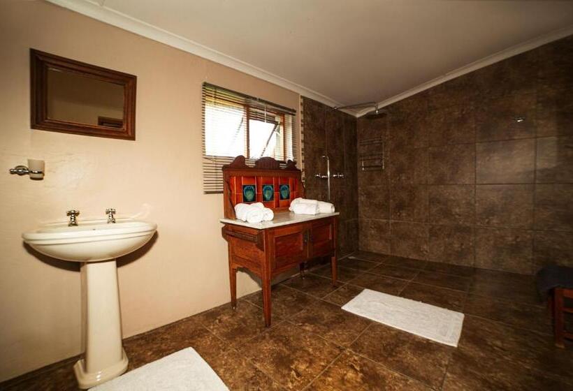 חדר אקונומי, Sandy's Place