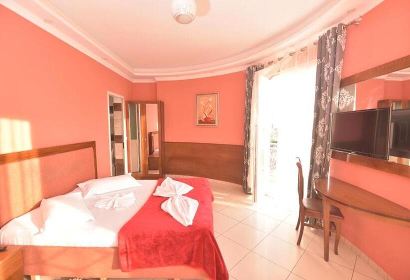 Quarto Deluxe com Balcão, Emigranti