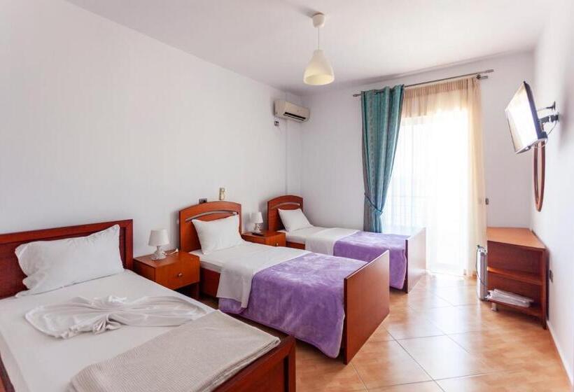 Номер Стандарт Вид на Горы, Dhima