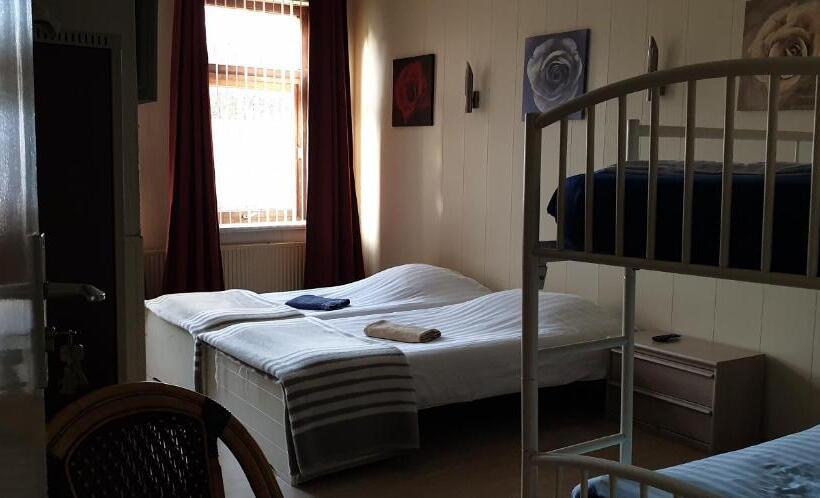 חדר סטנדרט לשלושה, De Zevende Hemel