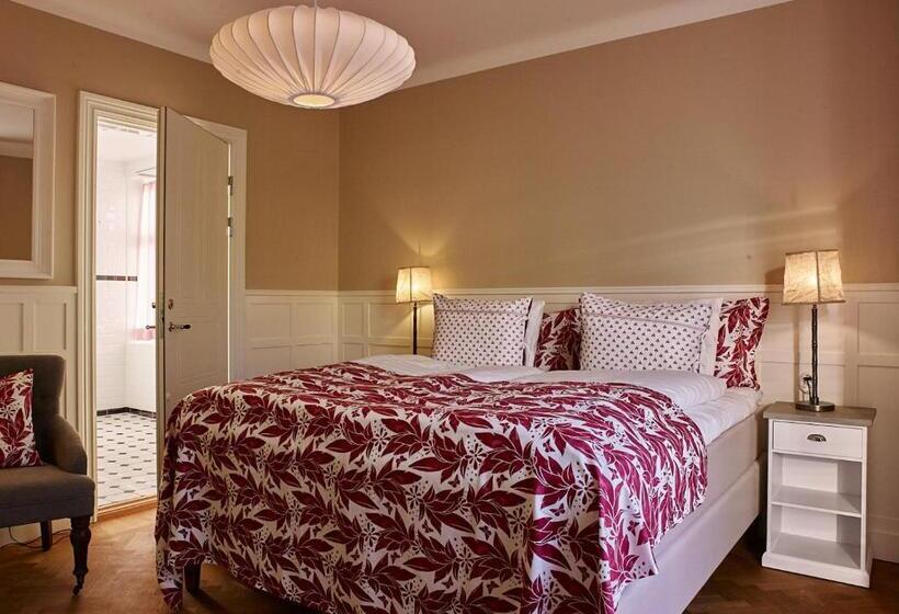 Quarto deluxe, Millasvilla