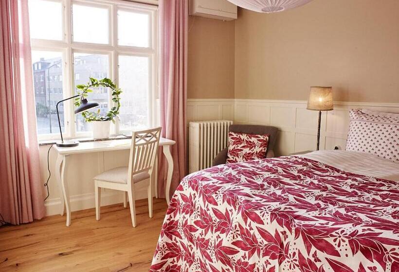 Quarto deluxe, Millasvilla