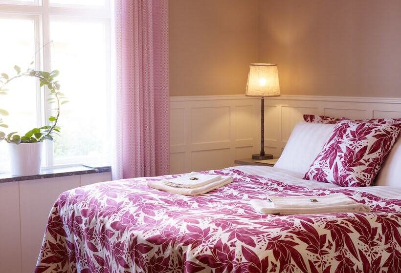 Quarto deluxe, Millasvilla